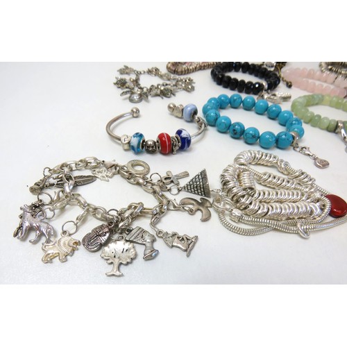 223 - Job lot of fashion bracelets including Charmology Gemstone.