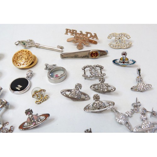 234 - Fashion Jewellery to include earrings, tie clips and pendants.