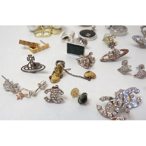 234 - Fashion Jewellery to include earrings, tie clips and pendants.