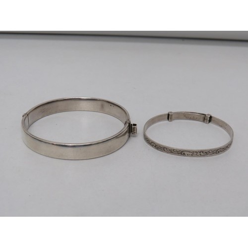 203 - Vintage sterling silver expanding  hinged bangle and silver expanding baby bangle -weight 22.5g