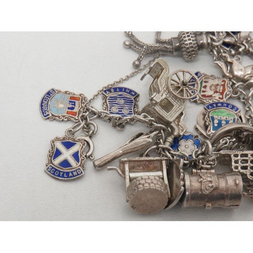 204 - Vintage sterling silver charm bracelet and charm- weight 69g