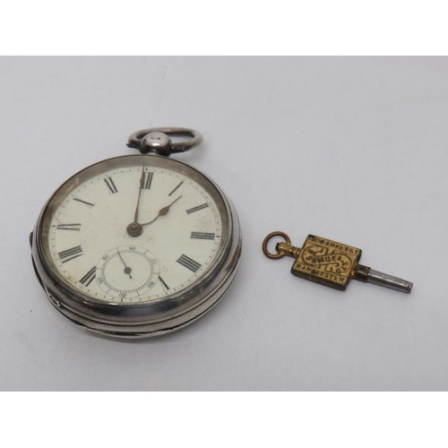 209 - Antique sterling silver cased pocket watch with key