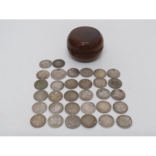 212 - Collection of silver coins in a treen pill box