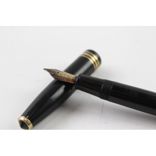 465 - Conway Stewart 77 black fountain pen with 14ct gold nib, writing