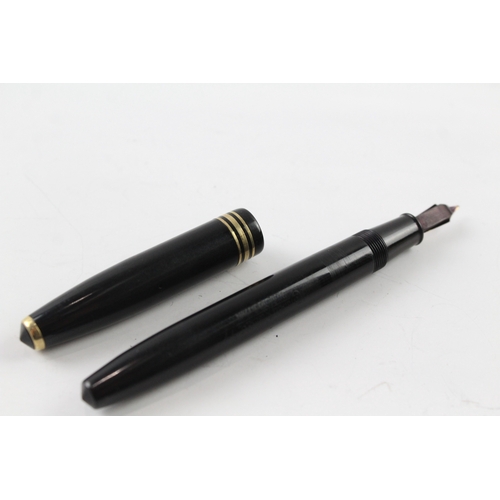 465 - Conway Stewart 77 black fountain pen with 14ct gold nib, writing