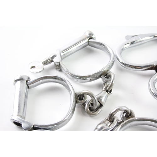 461 - Four Pairs Of Hiatt Handcuffs