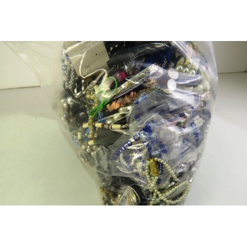 348 - 10kg bag of costume jewellery.