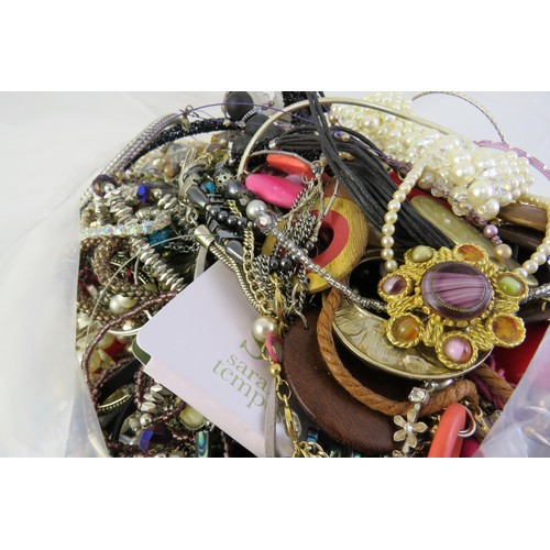 349 - 10kg bag of costume jewellery.