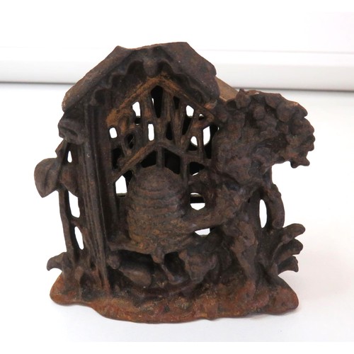 65 - Antique cast iron Bear & Hive money savings bank.