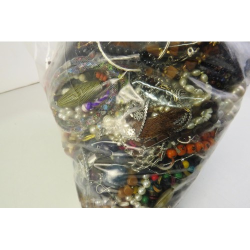 351 - 10kg bag of costume jewellery.