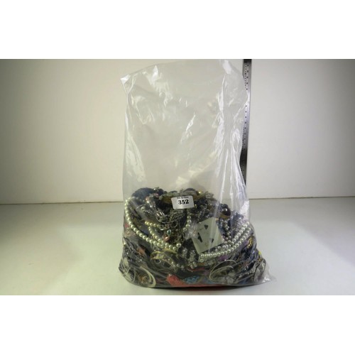 352 - 10kg bag of costume jewellery.