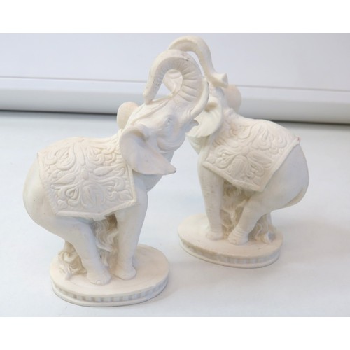 69 - A pair of Alabaster elephants, Portmerion Parian pair of jugs and boot.