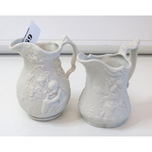 69 - A pair of Alabaster elephants, Portmerion Parian pair of jugs and boot.