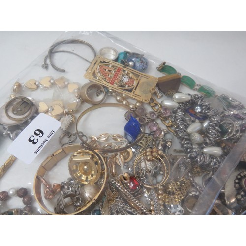 63 - Over 2kg of assorted Jewellery to include Vintage rings, brooches, necklace and bracelets.