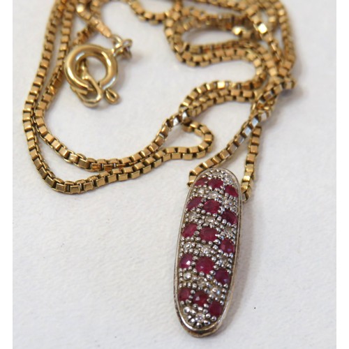 83 - 9ct gold Diamond and Rubies pendant necklace, 17