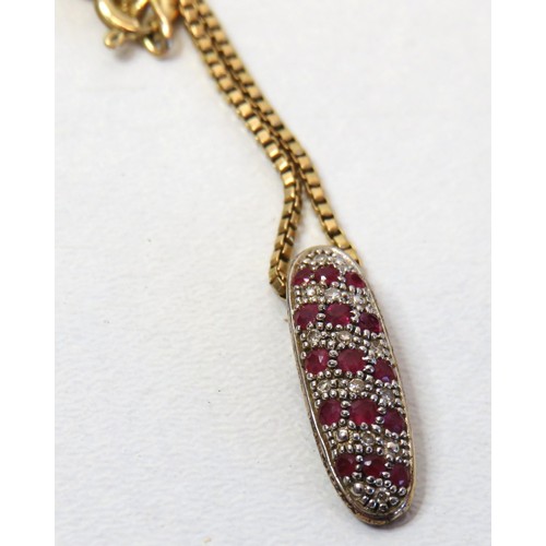 83 - 9ct gold Diamond and Rubies pendant necklace, 17