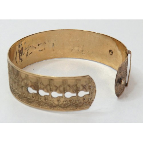 94 - 1920's Gold front and back adjustable bangle, H.G & S
Weight 19.3g.