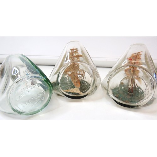 276 - Three Dimple Haigs ships in a bottle and Stemcol ship in a bottle.