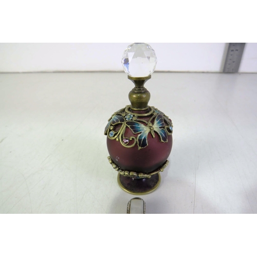 258 - Mother of pearl pen and ornate perfume bottle