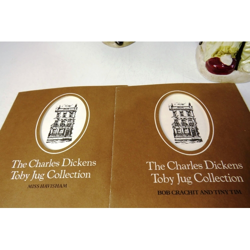 141 - Charles Dickens toby jug collection with certificate of authenticity