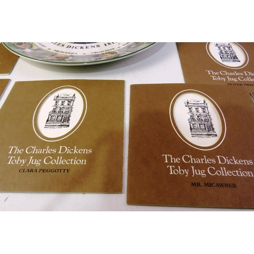 141 - Charles Dickens toby jug collection with certificate of authenticity