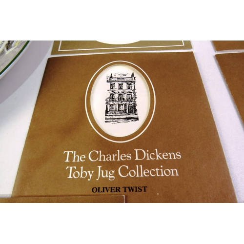 141 - Charles Dickens toby jug collection with certificate of authenticity