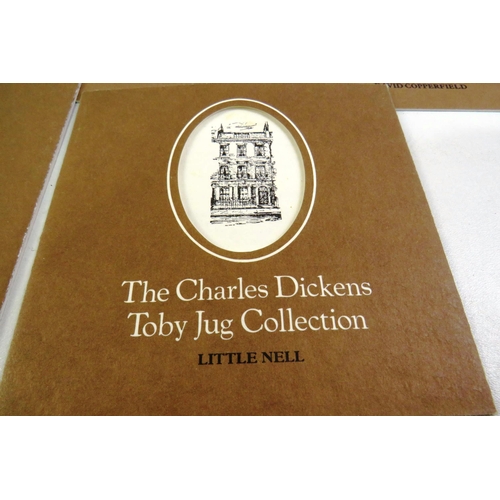 141 - Charles Dickens toby jug collection with certificate of authenticity