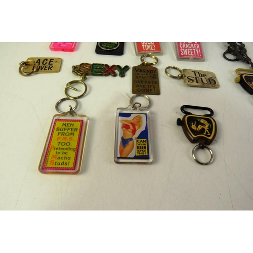 143 - Twenty-five novelty keyrings.