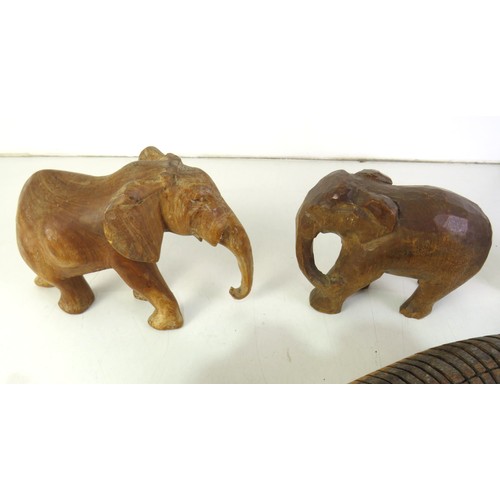 287 - Selection of wooden elephant ornaments and articulated wooden animal.