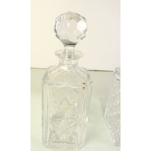 293 - Two cut glass decanters with stoppers.