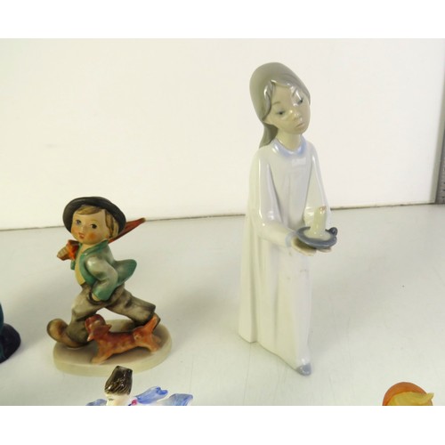 294 - Collectable ornaments to include Lladro, Royal Doulton, Hummel and Beswick.