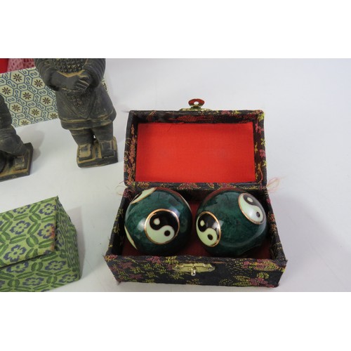 297 - Oriental chinese boading ball sets and boxed set of three terracotta warrior figures.