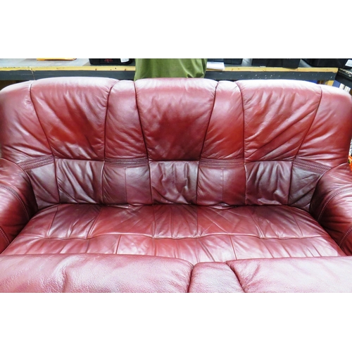 329 - Red leather two seater and three seater sofa