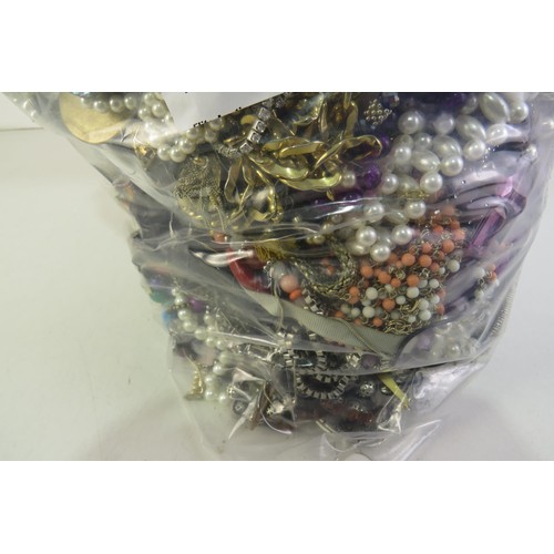 261 - 10kg bag of unsorted costume jewellery.