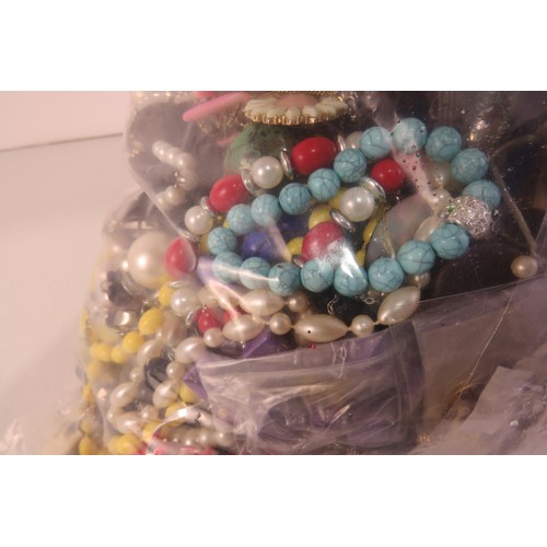 261 - 10kg bag of unsorted costume jewellery.