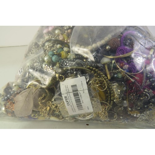 262 - 10kg bag of unsorted costume jewellery.