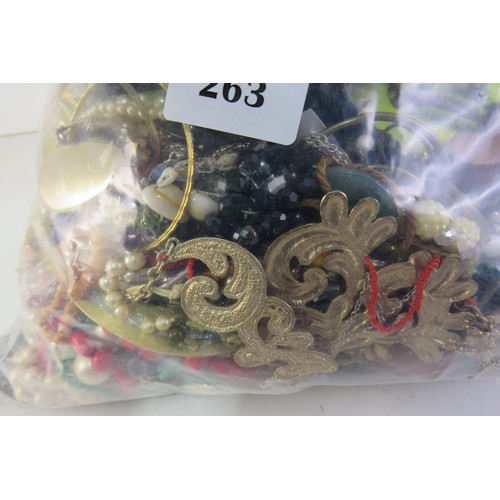 263 - 10kg bag of unsorted costume jewellery.