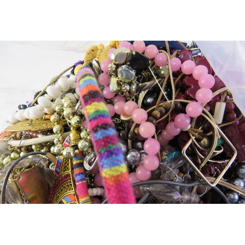 298 - 10kg bag of unsorted costume jewellery.