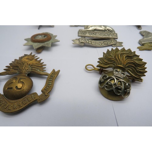 34 - 15 Military Cap/Regiment Badges