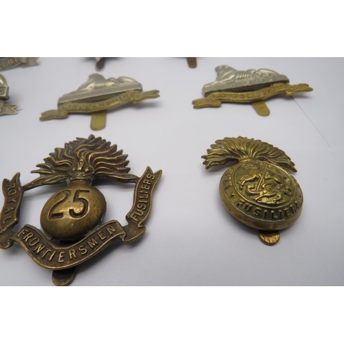 34 - 15 Military Cap/Regiment Badges