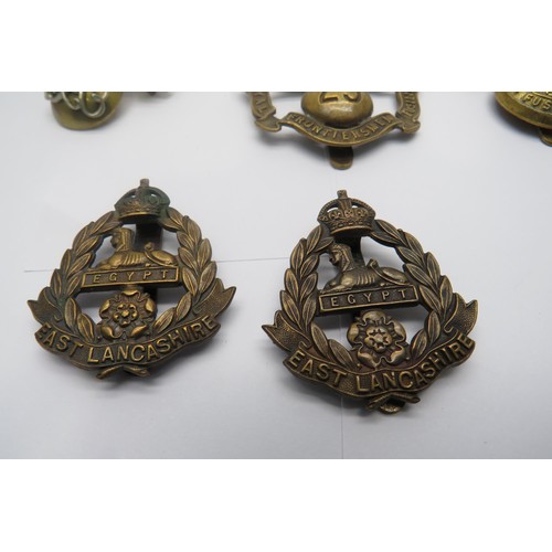 34 - 15 Military Cap/Regiment Badges