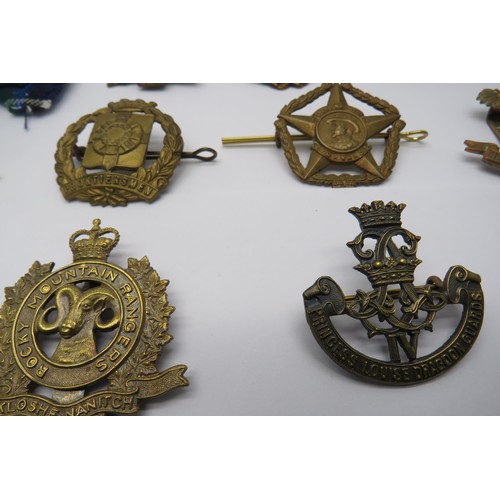 35 - 16 Military Cap/Regiment Badges