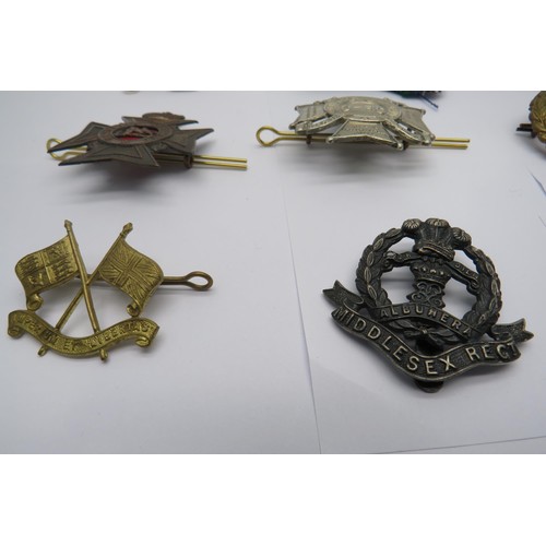 35 - 16 Military Cap/Regiment Badges