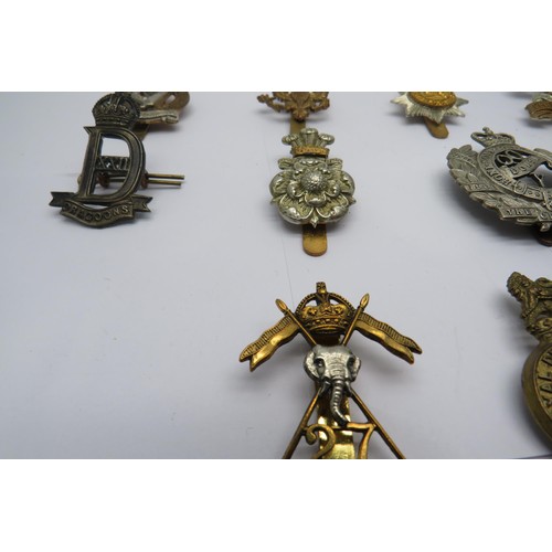 41 - 15 Military Cap/Regiment Badges