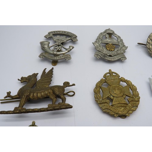 44 - 15 Military Cap/Regiment Badges