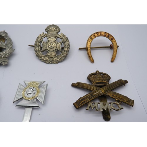 44 - 15 Military Cap/Regiment Badges