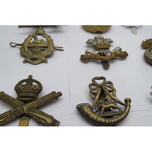 44 - 15 Military Cap/Regiment Badges