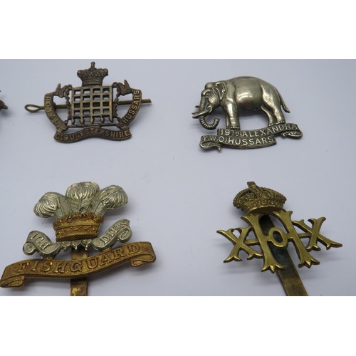 47 - 15 Military Cap/Regiment Badges