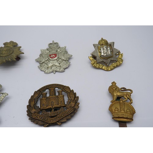 48 - 15 Military Cap/Regiment badges