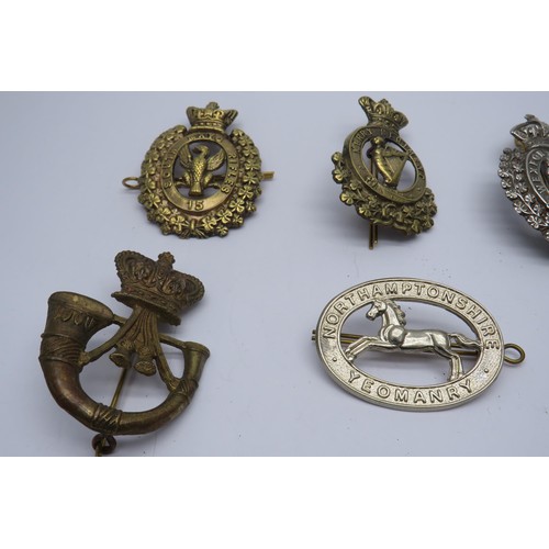 50 - 16 Military Cap/Regiment badges